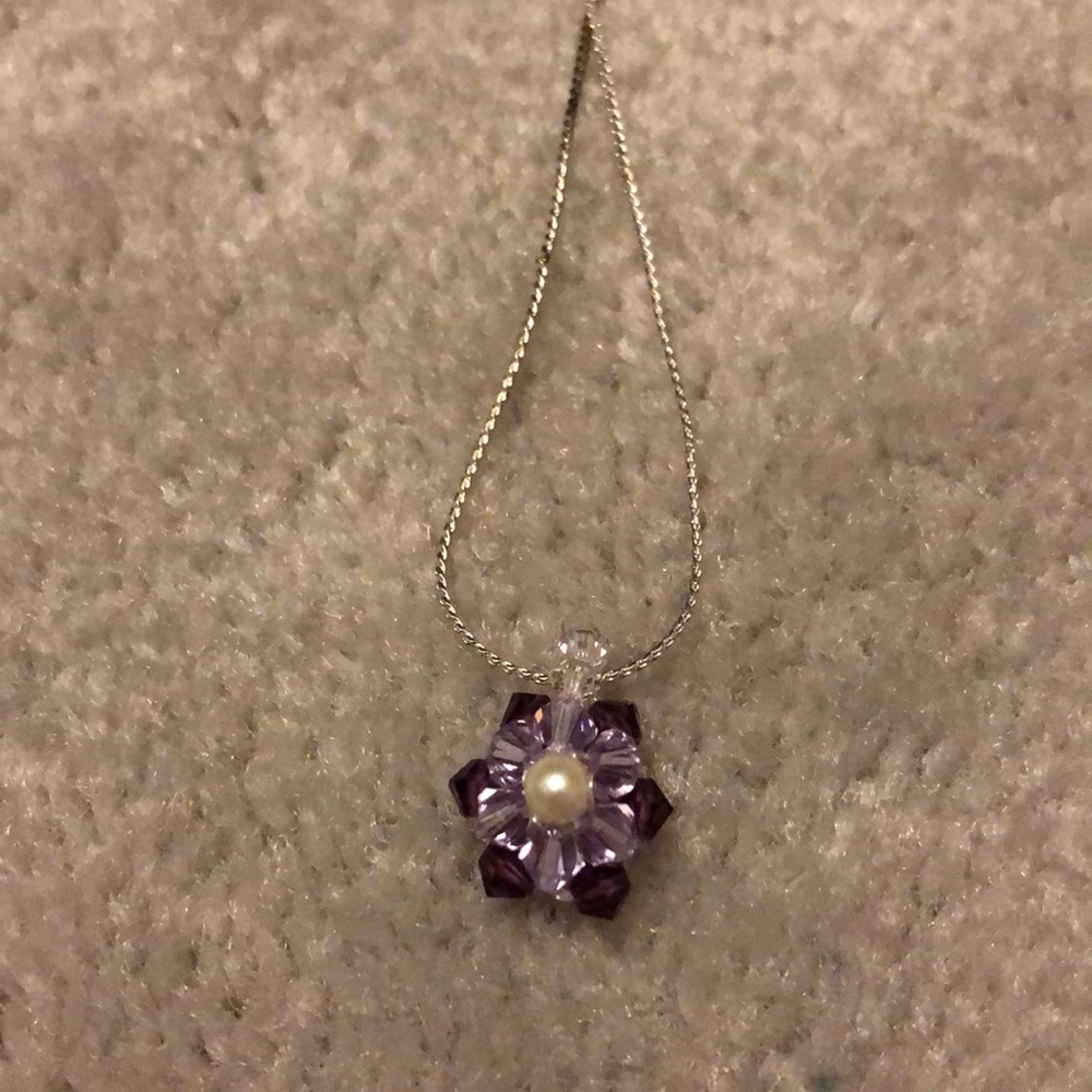 Purple flower necklace with pearl center